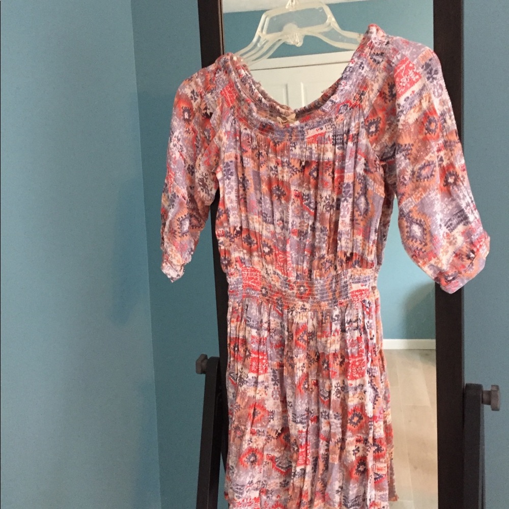 Off the shoulder Aztec pattern dress.